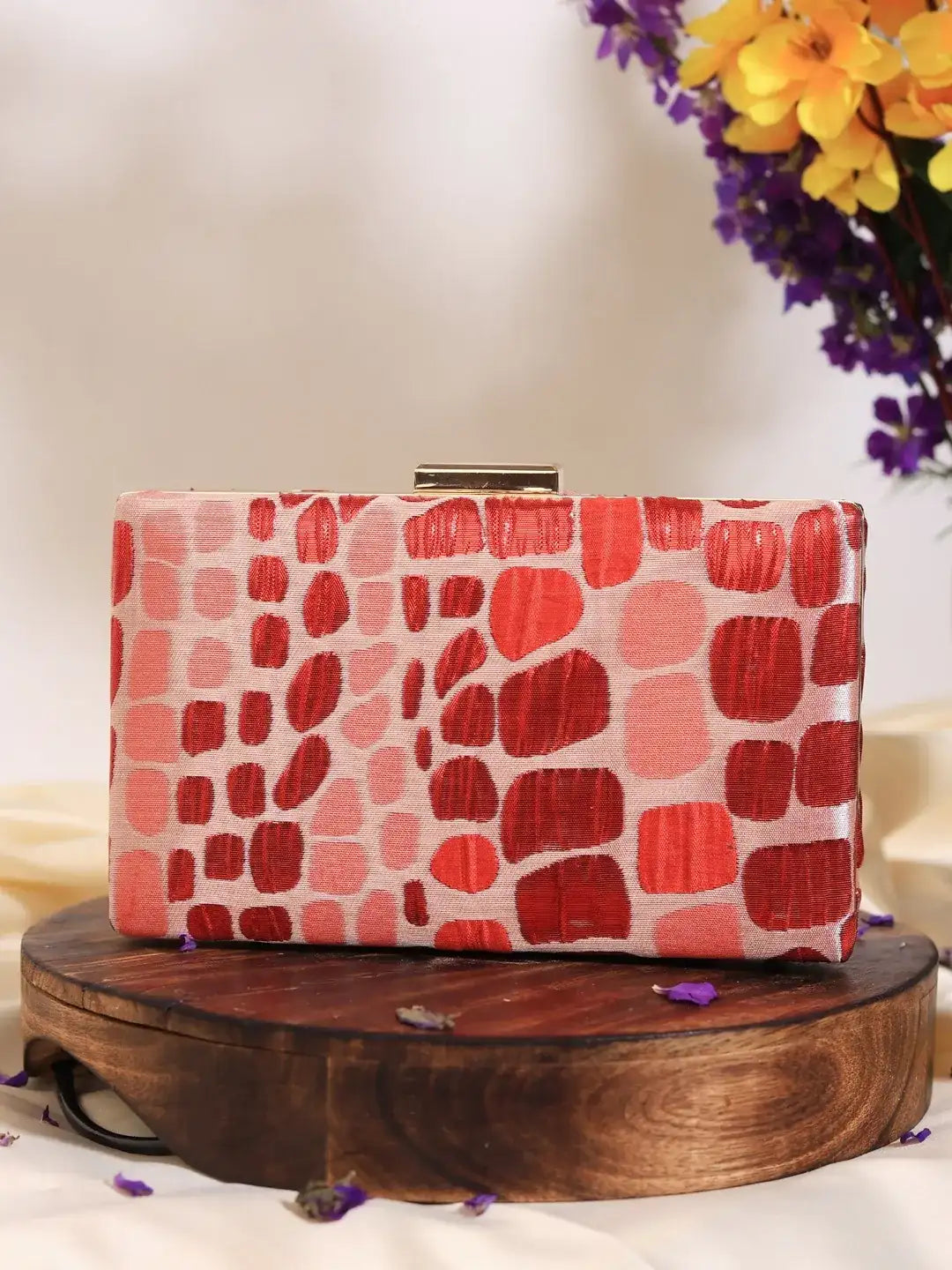Set of 5 coral-colored wedding favours from THE TAN CLAN, sleek and elegant for special celebration gifts.