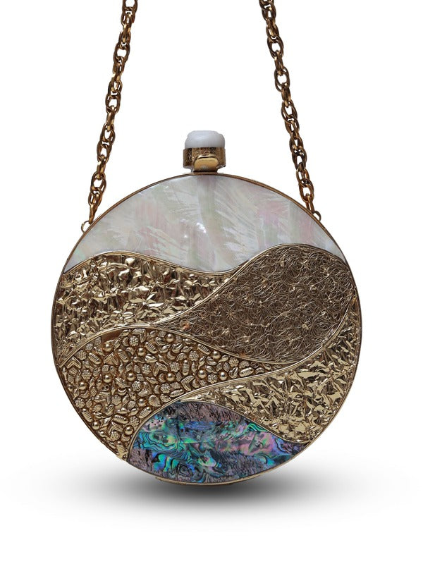 Crescent-shaped Mother of Pearl clutch bag by The Tan Clan with iridescent, shimmering surface and compact design.