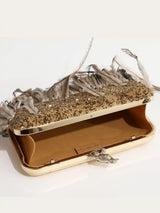 Dark gold hand-embroidered feather clutch by The Tan Clan featuring intricate embroidery and a stylish, compact design.