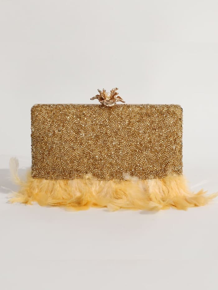 Daina Light Gold hand-embroidered feather clutch by The Tan Clan with intricate embroidery and elegant design.