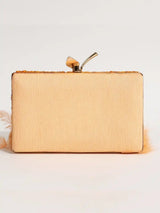 Peach Daina hand-embroidered feather clutch by The Tan Clan showcasing intricate feather embroidery and elegant design.
