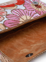 Daisy floral baguette bag with handle by The Tan Clan, featuring vibrant daisy print and a sleek, compact design.
