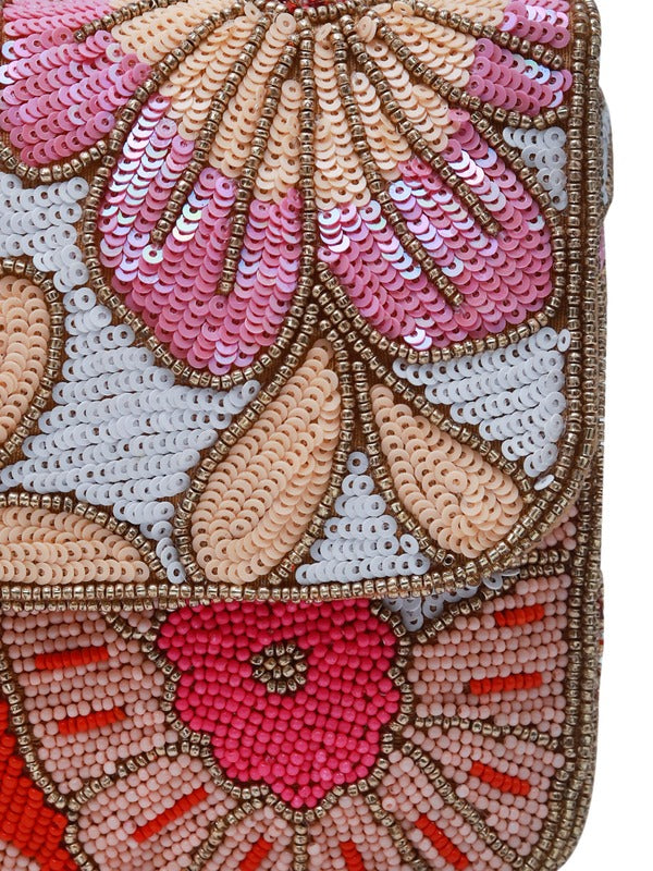 Daisy floral baguette bag with handle by The Tan Clan, featuring a vibrant floral pattern and a sleek, compact design.