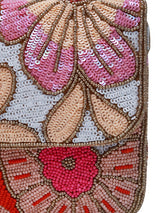 Daisy floral baguette bag with handle by The Tan Clan, featuring a vibrant floral pattern and a sleek, compact design.