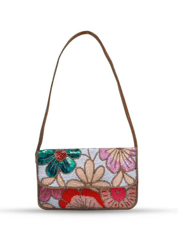 Daisy floral Baguette bag with handle by The Tan Clan, featuring colorful daisy pattern and compact design.