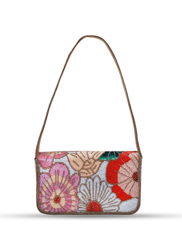 Daisy floral baguette bag with handle by The Tan Clan, featuring a colorful daisy pattern and a sleek rectangular shape.