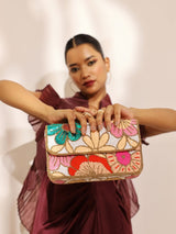 Daisy floral baguette bag with handle from The Tan Clan, featuring a colorful floral pattern and stylish carry handle.
