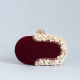 Dariya Sea Shells Hand Embroidered Clutch by The Tan Clan, featuring intricate sea shell embroidery on a stylish fabric clutch.