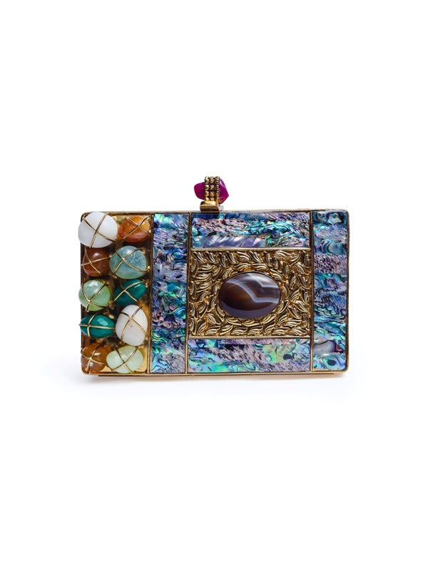 Disha Mother of Pearl Clutch by The Tan Clan featuring a shimmering pearl finish and elegant design for special occasions.