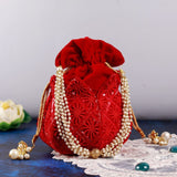 Hand embroidered lotus design on beige fabric, traditional Ehsaas Hand Embroidered Lotus Potli by The Tan Clan.
