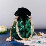 Hand-embroidered lotus design on beige fabric Ehsaas potli bag by The Tan Clan, featuring traditional Indian craftsmanship.