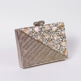 Silver embellished brass clutch bag with intricate design, crafted by The Tan Clan, perfect for elegant evening occasions.