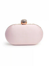 Baby pink Zardozi hand-embroidered clutch by The Tan Clan featuring intricate embroidery and elegant design.