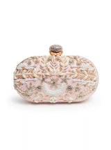 Baby pink Zardozi hand-embroidered clutch by The Tan Clan with intricate floral embroidery and elegant design.