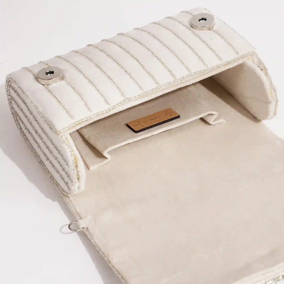 Grace Embellished Flap Over Bag by The Tan Clan, white handbag with decorative embellishments and flap closure.