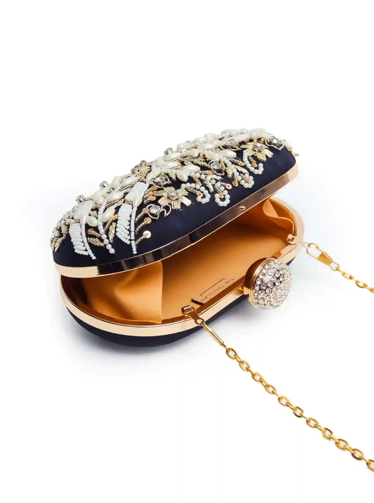 Elizah Black Zardozi hand-embroidered clutch with intricate gold detailing and white flap, stylish accessory from The Tan Clan.