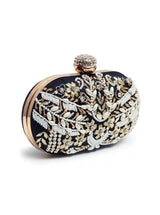 Black Zardozi embroidered clutch bag with intricate hand embroidery and a white flap, from The Tan Clan's Elizah collection.