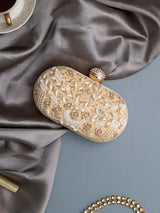 Elizah Gold Zardozi hand-embroidered clutch by The Tan Clan, featuring intricate gold needlework and traditional design details.