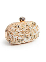 Elizah gold Zardozi hand-embroidered clutch by The Tan Clan showing intricate gold embroidery and elegant design.