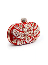 Red Zardozi embroidered clutch bag with intricate hand embroidery from The Tan Clan, featuring traditional craftsmanship and elegant design.