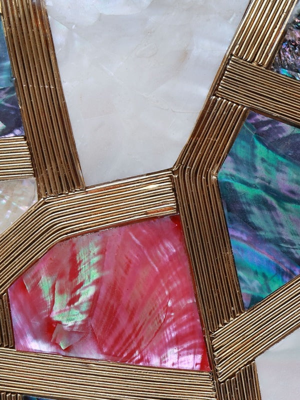 Multicolor mother of pearl Emily clutch handbag by The Tan Clan with a sleek, elegant design and metallic clasp.