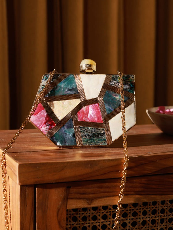 Multicolor mother of pearl clutch bag by The Tan Clan, featuring a sleek, elegant design with iridescent surface and compact size.