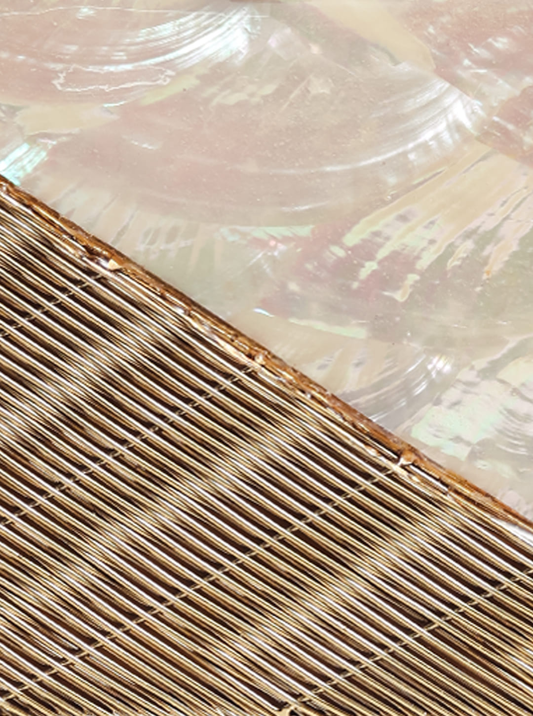 Golden brass clutch with intricate embellishments from The Tan Clan, featuring detailed craftsmanship and elegant design.
