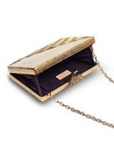 Erum golden embellished brass clutch with intricate design and decorative accents, stylish accessory for special occasions.