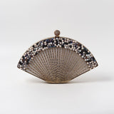 Faiza embellished mother of pearl clutch by The Tan Clan with intricate detailing and elegant design, perfect for special occasions.