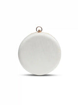 White round clutch by The Tan Clan with intricate hand embroidery, perfect for elegant occasions.