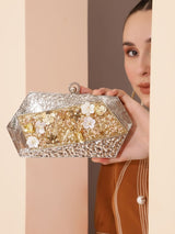 Silver embellished brass clutch bag with intricate details, designed by The Tan Clan for elegant evening wear.
