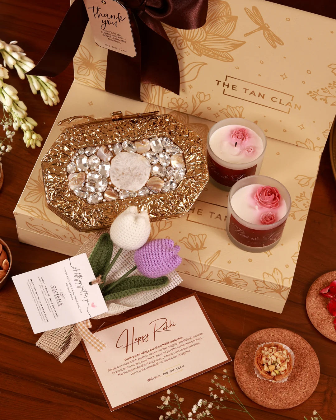 Elegant Floral Grace Hamper by The Tan Clan featuring a bouquet of colorful flowers and decorative wrapping.