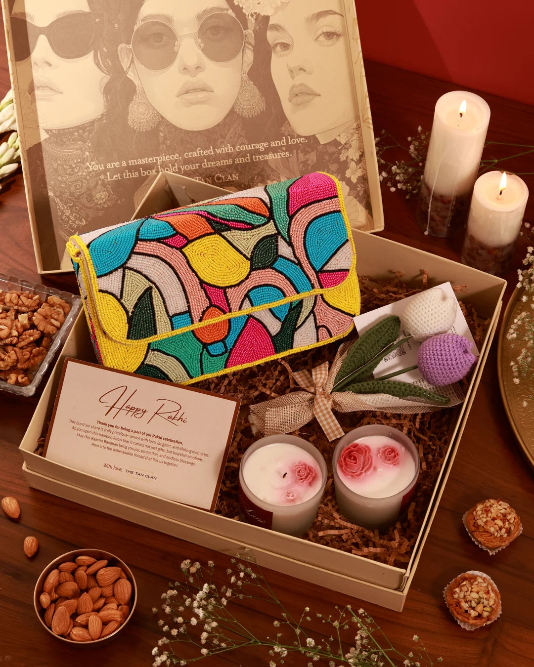 Floral Grace Hamper Poppy by The Tan Clan featuring a bouquet of vibrant flowers in a stylish wicker basket.