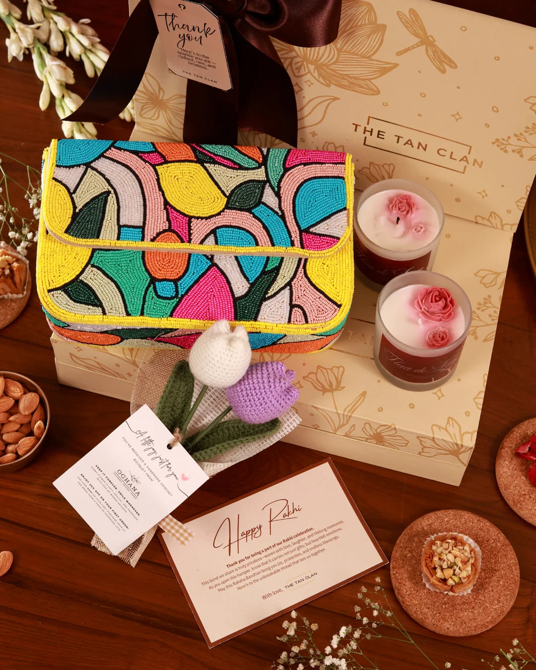 Elegant floral Grace Hamper by The Tan Clan featuring vibrant poppy flowers and assorted gift items in a stylish arrangement.
