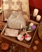 Floral Grace Hamper by The Tan Clan featuring a bouquet of mixed flowers and elegant gift packaging.