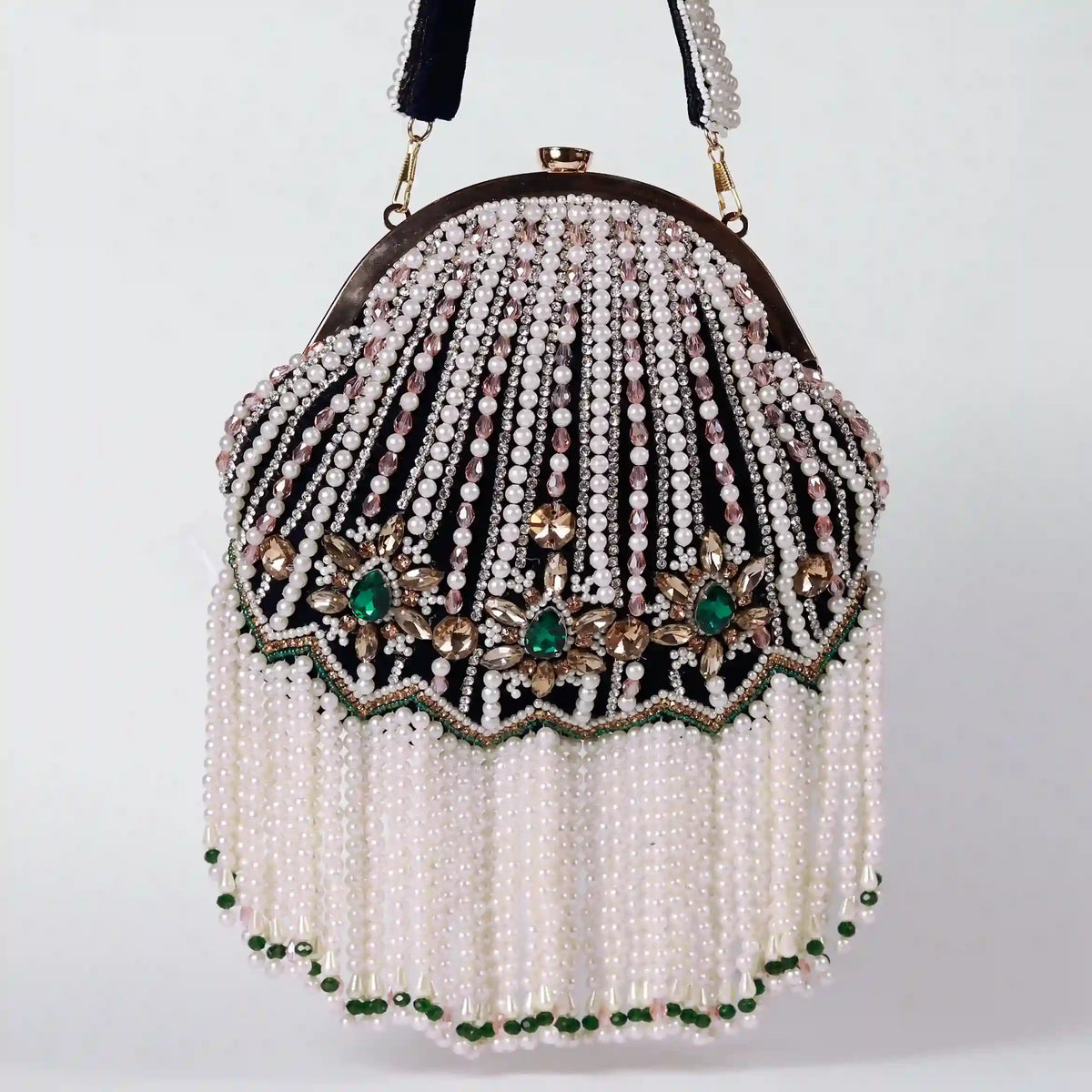 Black Frida Batua Bag with Detachable Handle by The Tan Clan, showcasing its stylish design and versatile carrying options.