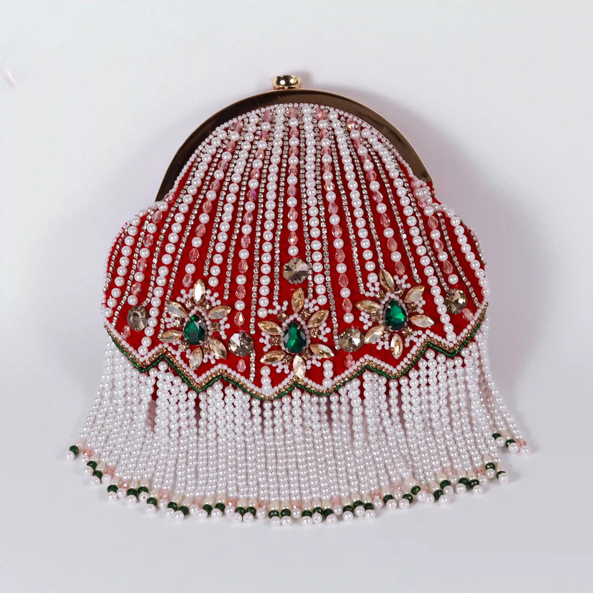 Red Frida Batua Bag by The Tan Clan with a detachable handle, showing the stylish bag with sleek design and vibrant color.