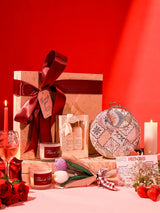 Premium gift set from THE TAN CLAN featuring 4 stylish items and a matching clutch in a sleek box.