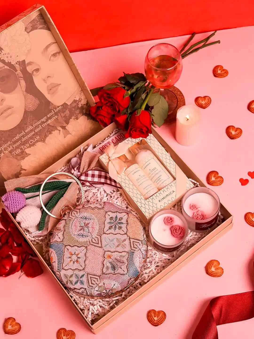 Premium gift set from THE TAN CLAN featuring four stylish items and a matching clutch, perfect for gifting or personal use.