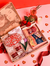 Premium gift set from THE TAN CLAN featuring 8 items and a stylish clutch in a sleek box, ideal for special occasions.