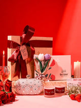 Premium gift set by THE TAN CLAN featuring 8 items and a stylish clutch in a sleek box.