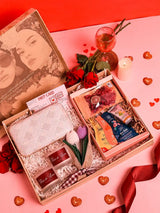 Premium gift set by THE TAN CLAN featuring a box of 8 items and a stylish clutch bag, perfect for gifting occasions.
