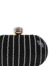 Glow black sequins oval clutch by The Tan Clan featuring shimmering sequins and a sleek, elegant design for evening wear.