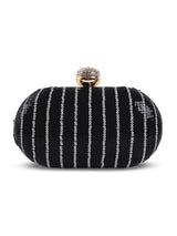 Glow Black Sequins Oval Clutch by The Tan Clan with shimmering sequin detailing and elegant oval shape.