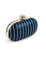Glow blue sequins oval clutch by The Tan Clan featuring shimmering sequined surface and elegant oval shape.