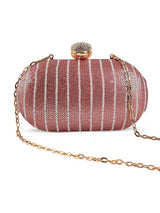 Glow pink sequins oval clutch by The Tan Clan with shimmering sequin surface and elegant oval shape.