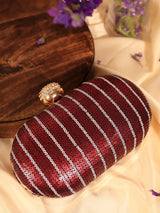 Maroon sequins glow oval clutch bag by The Tan Clan, featuring sparkling embellishments and a sleek, elegant design.