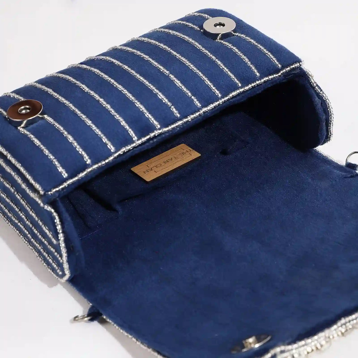 Grace Embellished Flap Over Bag by The Tan Clan showing a stylish bag with decorative embellishments and a flap closure.
