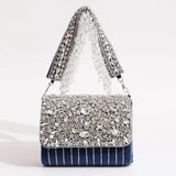 Grace Embellished Flap Over Bag by The Tan Clan, featuring decorative embellishments and a stylish flap-over design.