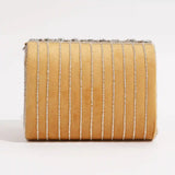 Grace embellished flap-over bag by The Tan Clan featuring a stylish design with decorative accents and a top handle.